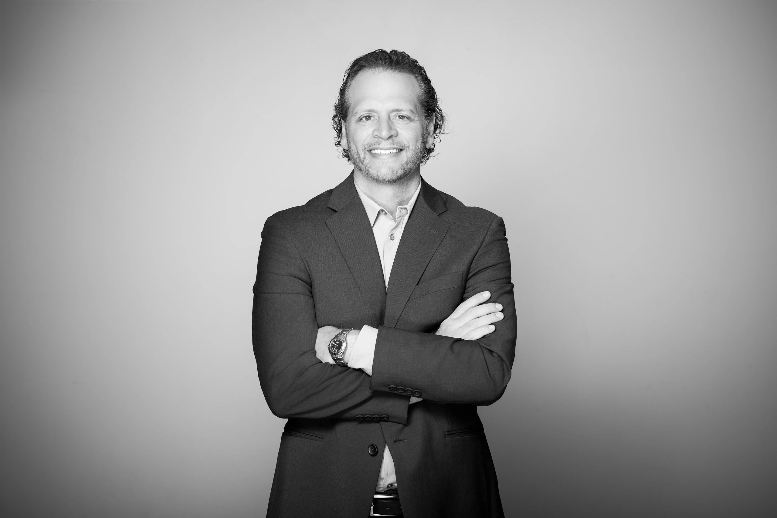 Jason Amato black and white portrait - business systems and scaling expert
